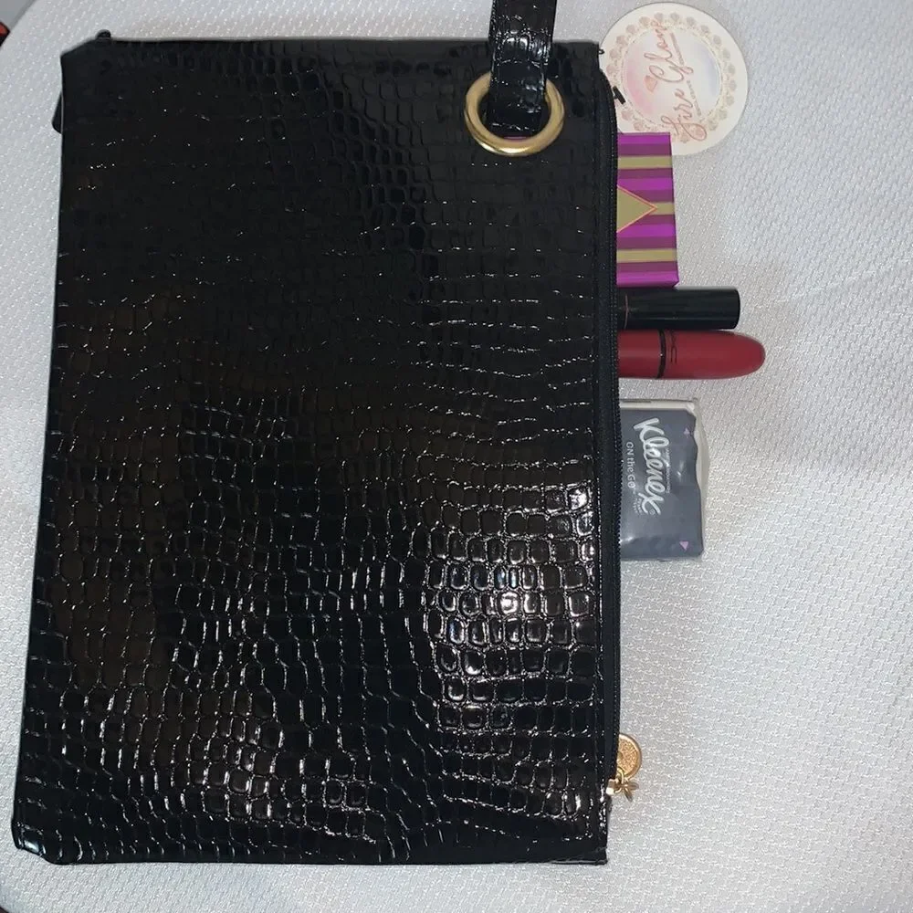 Zipper Black clutch/ wristlet  style purse in faux patent leather.